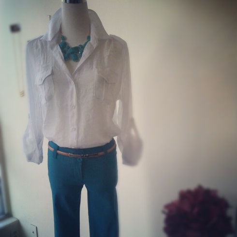 White collared linen blouse with cognac belt and turquoise pant