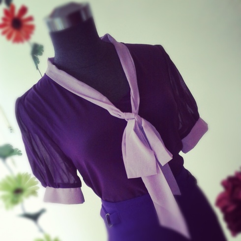 Mad Men inspired two-tone violet blouse.